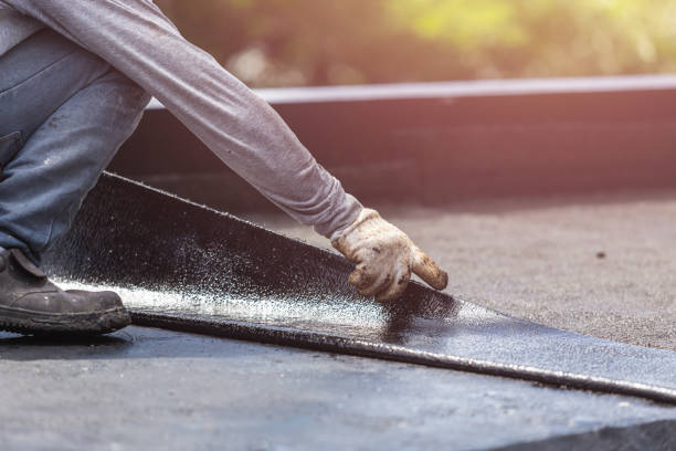 Professional Basement Waterproofing technician working in Etna, PA